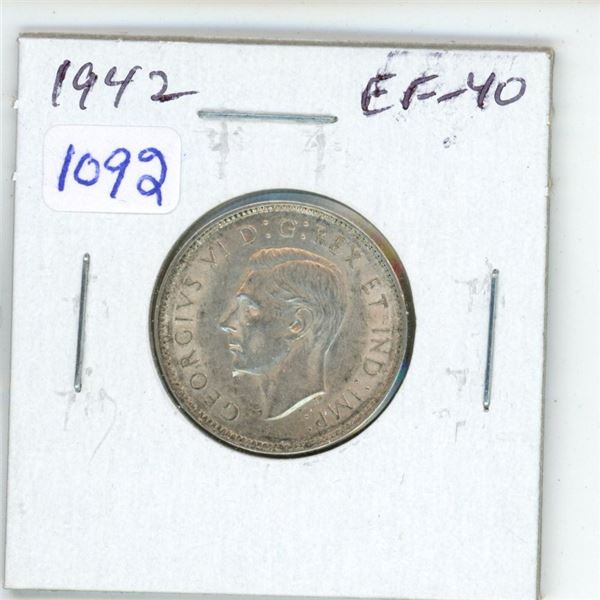 1942 Canadian Silver 25 Cents. Minted during World War II. EF-40. Nice.