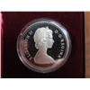 Image 2 : 1981 Canadian Proof Silver Dollar. Commemorates the beginning of the building of the Trans-Canada Ra