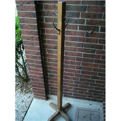 Sold wood coat rack.