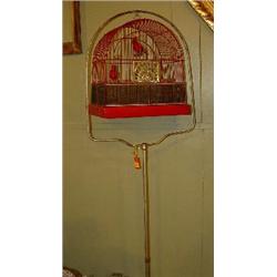 Metal bird cage on stand