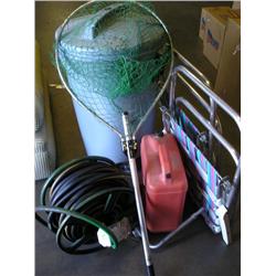 Trash can w/hoses, net, lawn chairs.