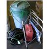Image 1 : Trash can w/hoses, net, lawn chairs.