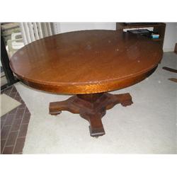 Round tiger oak dining table