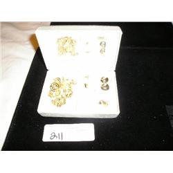 Costume jewelry in case.