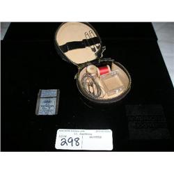 Old sewing needles and case.