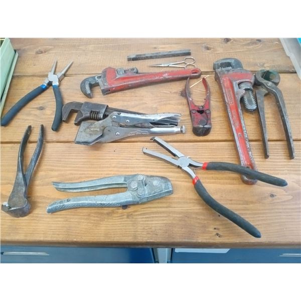 Assortment Of Pipe Wrenches And Metal Snips
