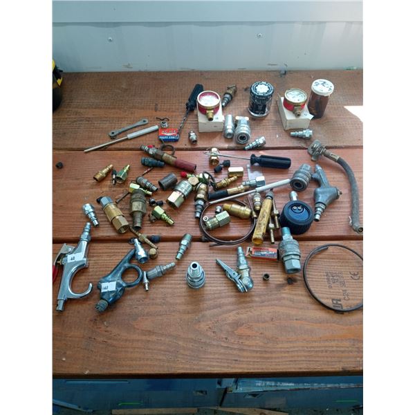 Assortment Of Air Compressor Accessories And Supplies