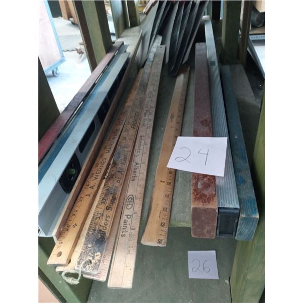 Assortment of Levels And Measuring sticks