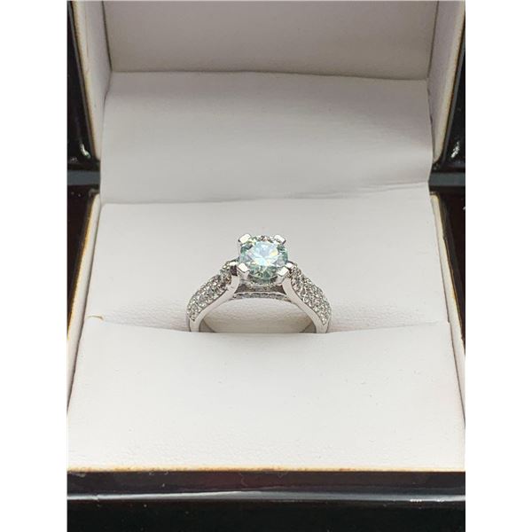 2.15 CT CENTER MOISSANITE WITH 34 ROUND CUT CUBIC ZIRCONIUM SET IN SHANKS THAT WEIGH A TOTAL 0.20 CT