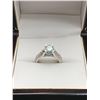 Image 1 : 2.15 CT CENTER MOISSANITE WITH 34 ROUND CUT CUBIC ZIRCONIUM SET IN SHANKS THAT WEIGH A TOTAL 0.20 CT