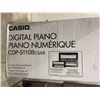 Image 1 : Casio digital piano with padded bench seat
