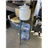 Image 2 : WATER DISPENSER ON STAND W/ 2 JUGS