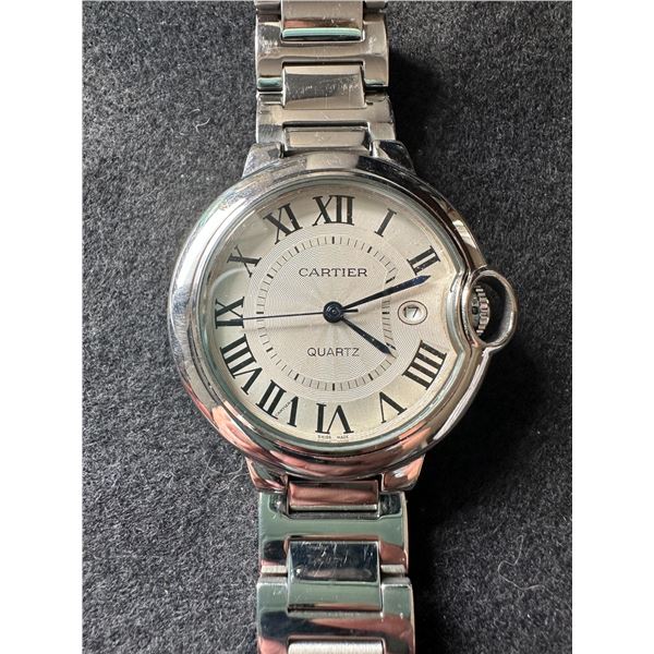 CARTIER women's watch - works!  See photos for more info.  Band is fairly small