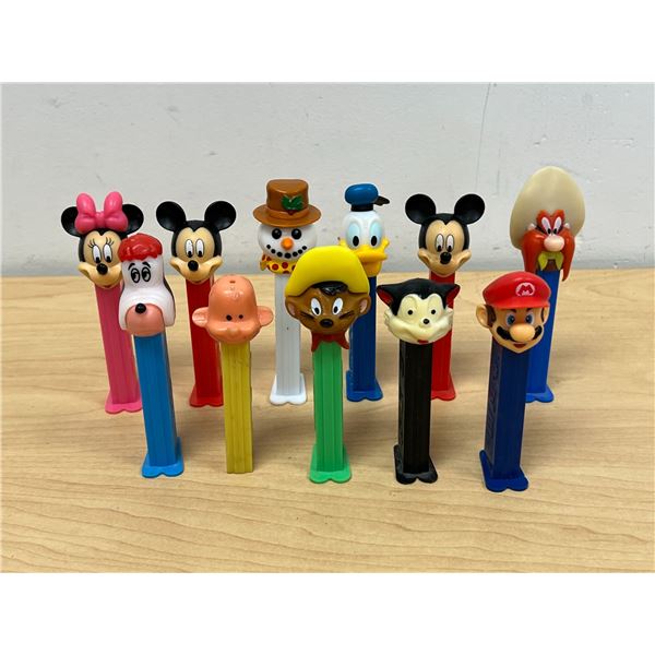 11 Pez Dispensers as pictured - Mickey & Minnie mouse / Donald Duck / Super Mario etc