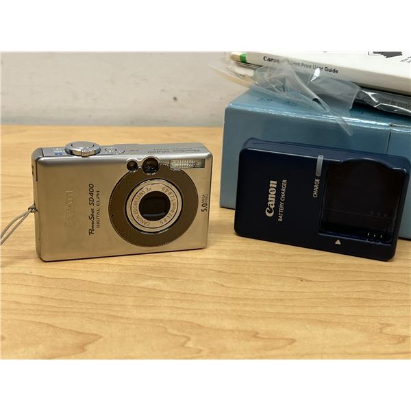 Canon Power Shot SD400 Digital Elph 5.0 megapixel 3X Optical zoom & accessories