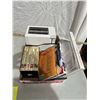 Image 1 : Cookbooks and toaster