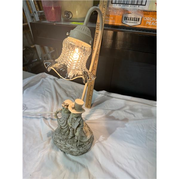 Table lamp with not and girl dress up