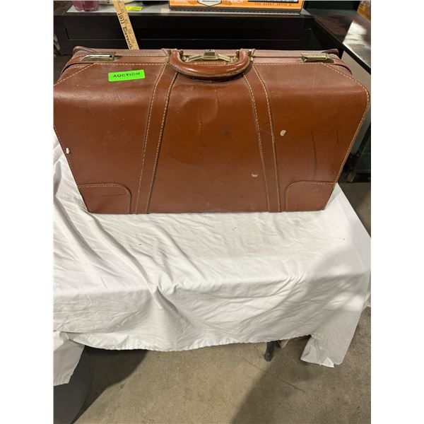 Travel guard vintage suitcase