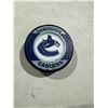 Image 1 : Vancouver Canucks puck