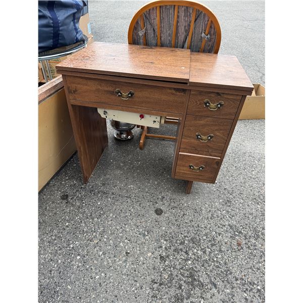 Kenmore sewing machine in cabinet