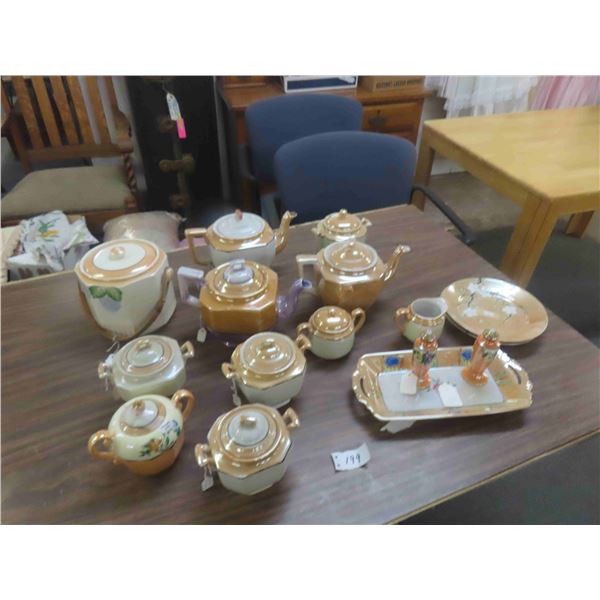 China, Tea Pots, Biscuit Jar, Cream, Sugars, Salt + Pepper Shakers