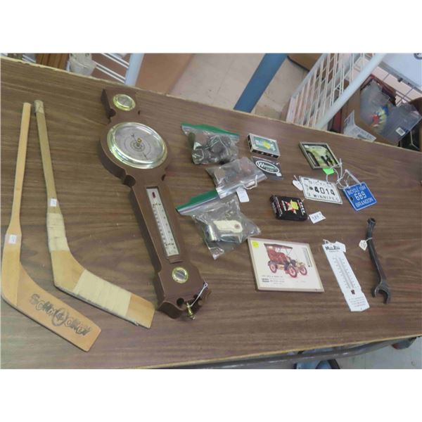 Bicycle License Plates, Barometer, Spigot, Ford Wrench, Leo's Case Thermometer,