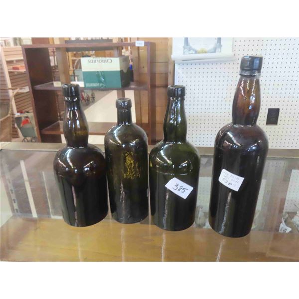 4 Liquor Bottles Over 100 yrs. Old
