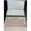 Image 2 : Lot of 2 Logitech Multi-Device K380 Minimalist Bluetooth Keyboards - White & Pink