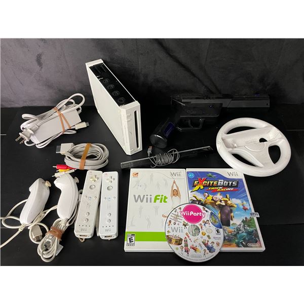 Lot of 1 Nintendo Wii Console with Cords, Controllers & 3 Games - Used (Powers On)