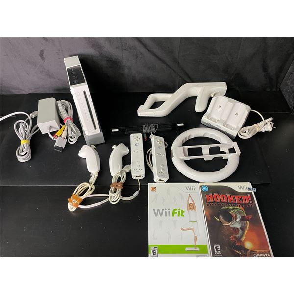 Lot of 1 Nintendo Wii Console with Cords, Controllers & 2 Games - Used (Powers On)
