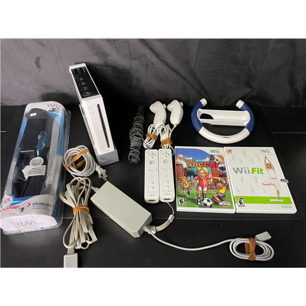 Lot of 1 Nintendo Wii Console with Cords, Controllers & 2 Games - Used (Powers On)