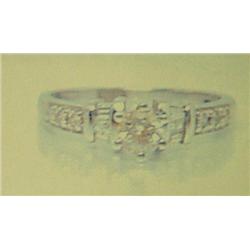 Diamond Lady's Ring, Platinum- diamond is round brilliant and baguette cut, approx. 0.75 carats, Si2