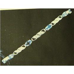Tanzanite and Diamond Bracelet, 14 k white gold- tanzanite are oval, faceted, approx. 3.00 carats, t