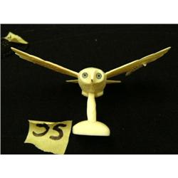In flight ivory owl ref. 595F signed by Peter Wingbiyi (2)