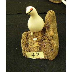 Ivory bird on whale bone (2)
