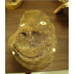 Whale bone carving of happy face with ivory eyes 9.5" (2)