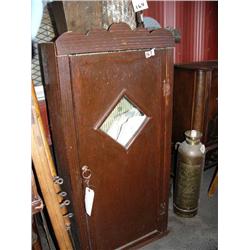 Small wood bookcase filled with old treasure maps