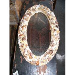 Mirror with seashell frame