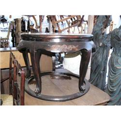 Round wood coffee table