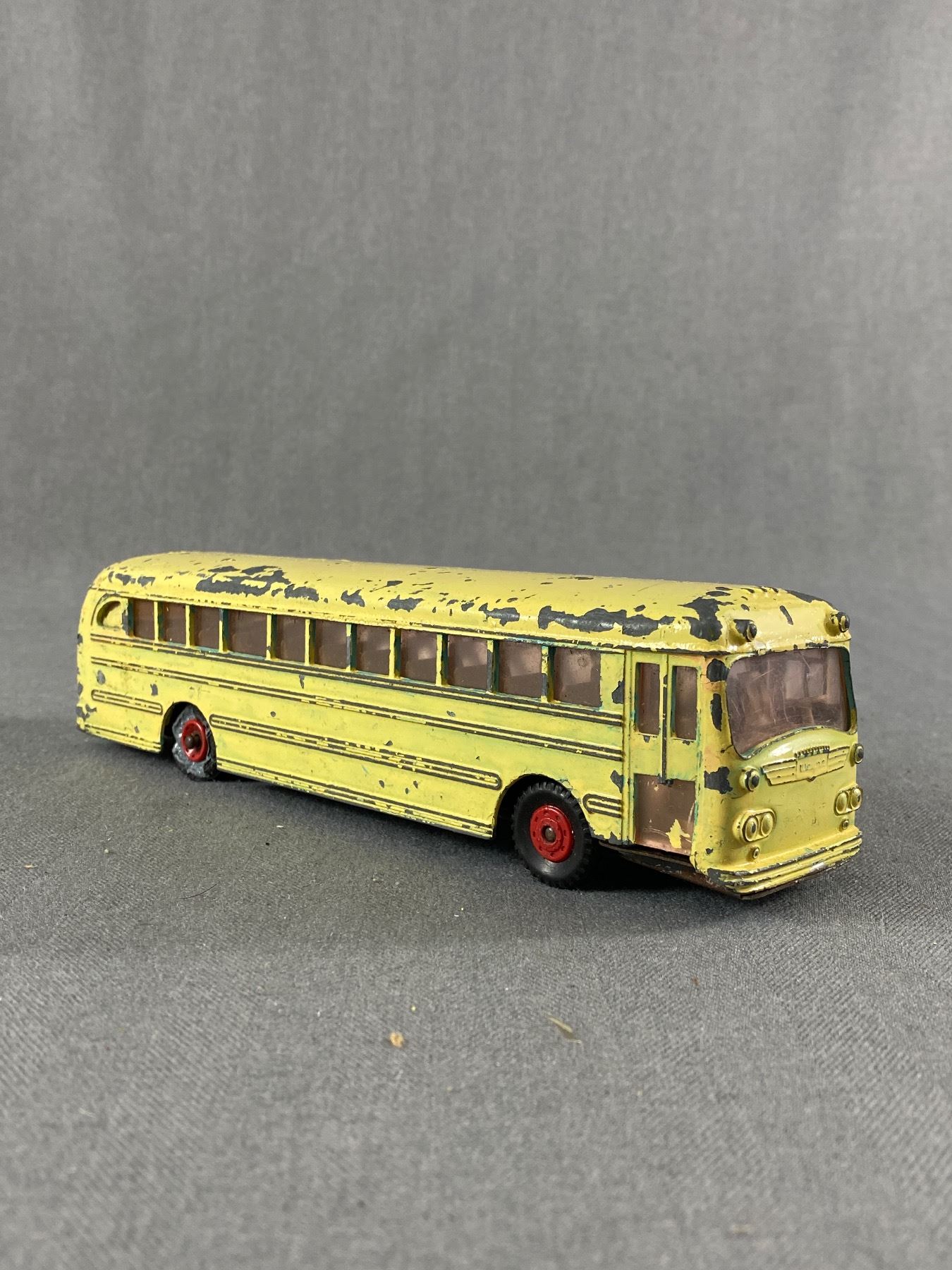 Four vintage buses, Dinky Supertoys Wayne Bus, two Dinky Toys Routemaster buses, and a Dinky Toys Ob Four vintage buses, Dinky Supertoys Wayne Bus, two Dinky Toys Routemaster buses, and a Dinky Toys Ob