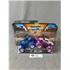Image 1 : 1/64 Scale Monster Jam Trucks 'Blue Thunder Vs. Full Charge'  In Original Packaging