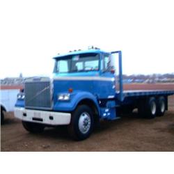 1984 VOLVO WCM64 T/A FLATBED DUMP TRUCK