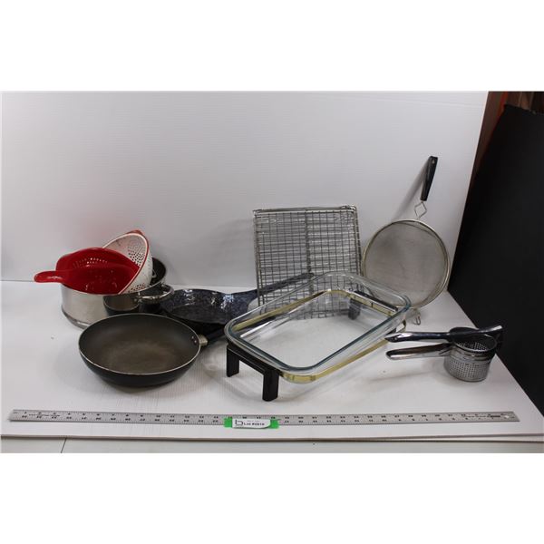 Various Kitchen Items - (4) Strainers, Sifter, (2) Frying Pans, (5) Cooling Racks, Glass Casserole D