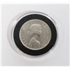Image 2 : 1957 CANADA HALF DOLLAR. 3OZ. SILVER IN RINGED