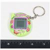 Image 1 : #1144 TAMAGOTCHI DIGITAL PET GREEN FLORAL WORKS!