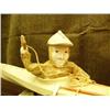 Image 3 : 31" seal hide kayak with Aleut hunter, ivory hands and face, Aleut hunting hat, harpoon, and ice too