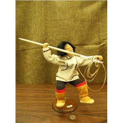 Wood face and hands man with wood and ivory harpoon 10" Penni Abraham in 2003 wearing black corduroy