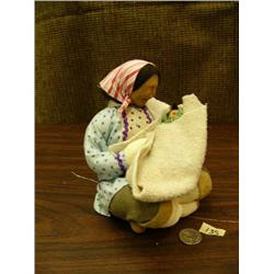 Mother and child singing, 7" tall by Shelley Chamberlain, carved wood face, wearing blue kuspuk with