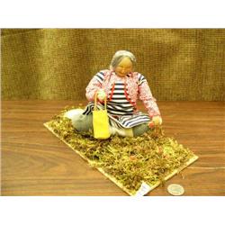 7" doll with carved wood face by Shelley Chamberlain, berry picker (152)