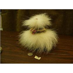 Seal skin and polar bear hide group of flowers in vase (152)